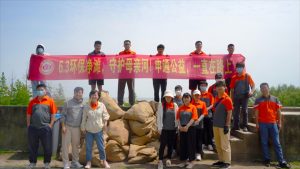 響應“世界環境日”號召 申通聯合崇明水務局海塘管理所 開展“環保凈灘”活動-物流之家